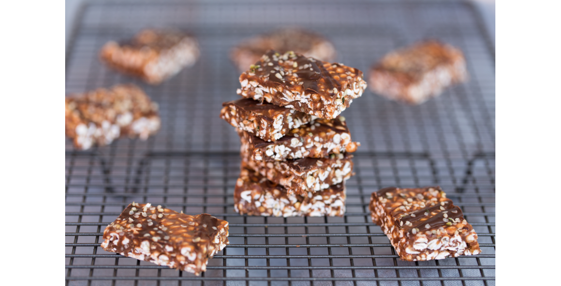 Buckwheat and hemp seed bars sprinkled with bittersweet chocolate
