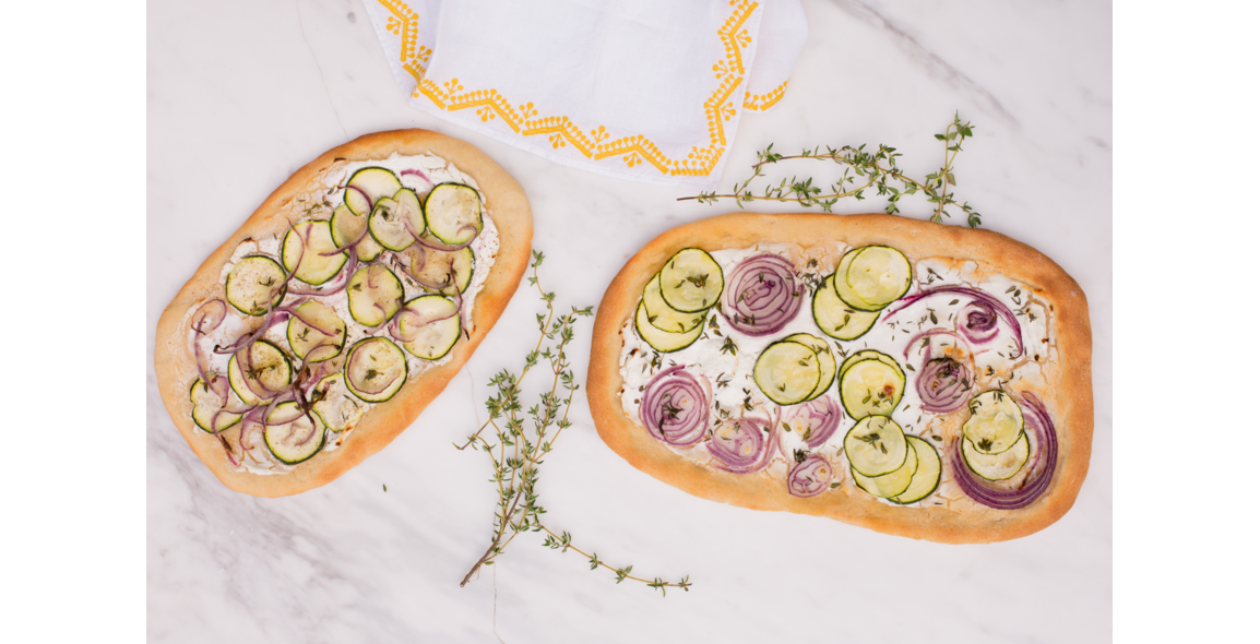 Pizza with goat cheese and zucchini