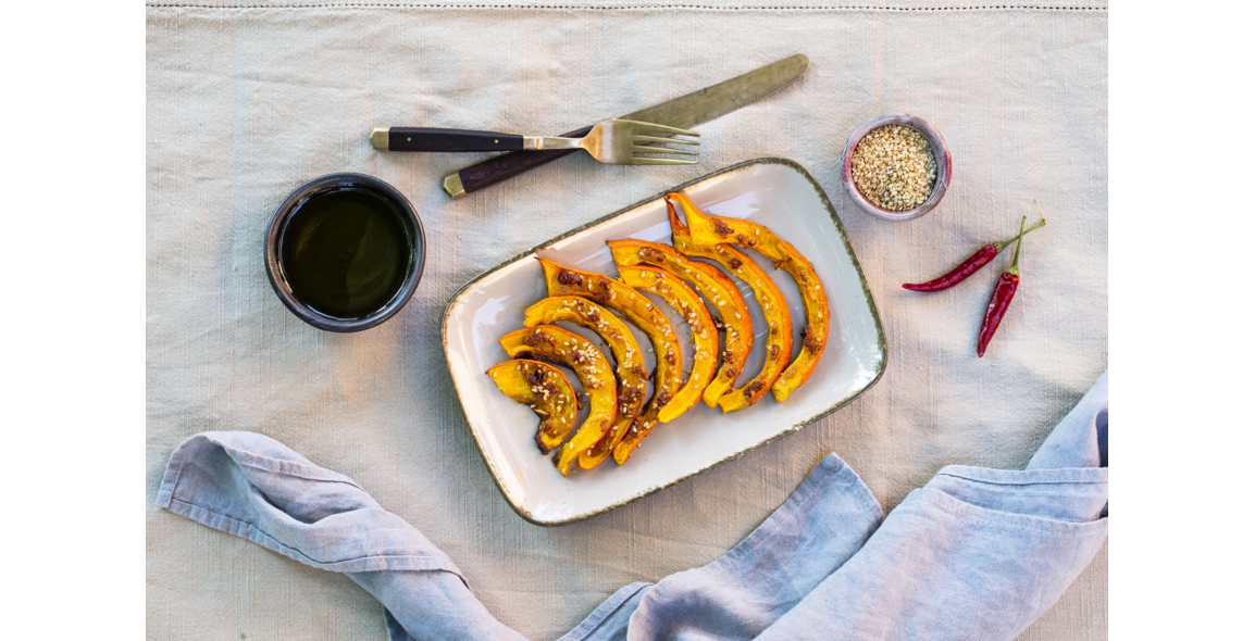 Hokkaido pumpkin wedges with soy sauce and sesame