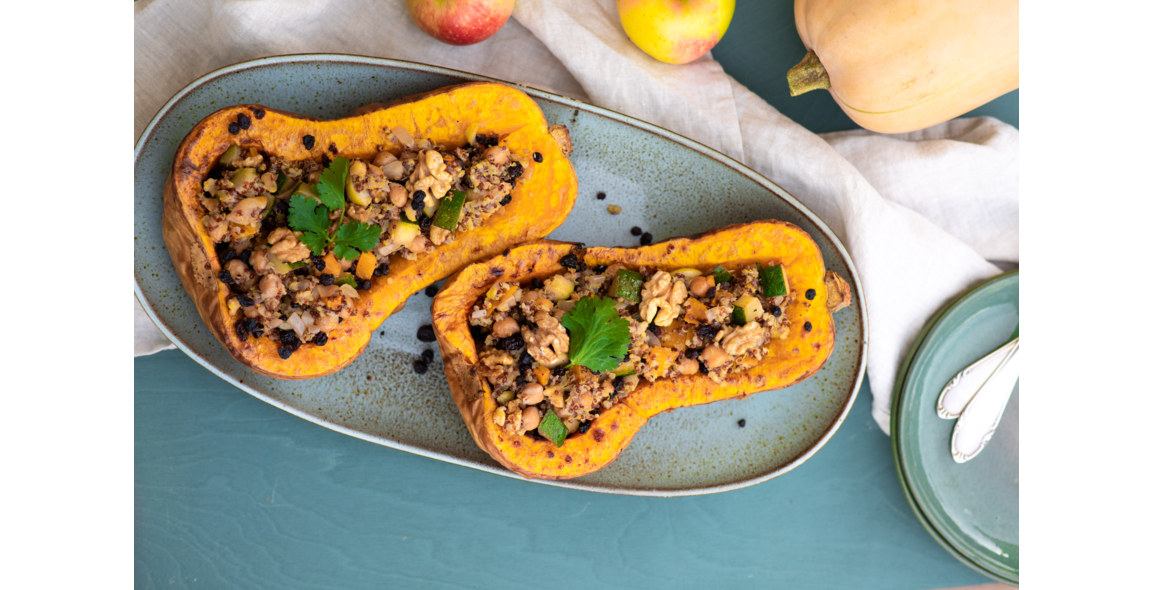 Baked butternut squash with quinoa, veggies, chickpea and currant