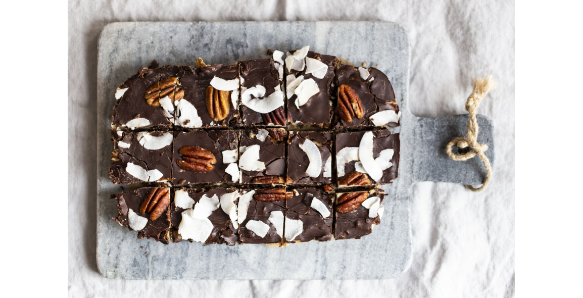 Chocolate bars of puffed rice, Pecan nuts and coconut chips