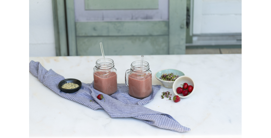 Smoothie with strawberries and sprouts