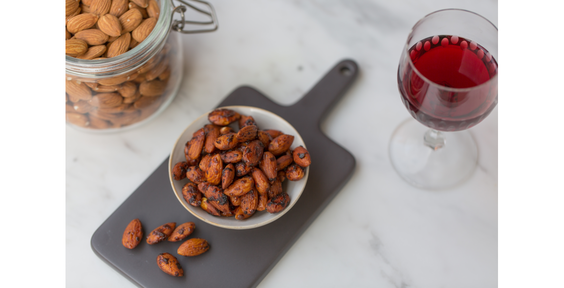 Roasted almonds with coconut blossom syrup and yeast flakes