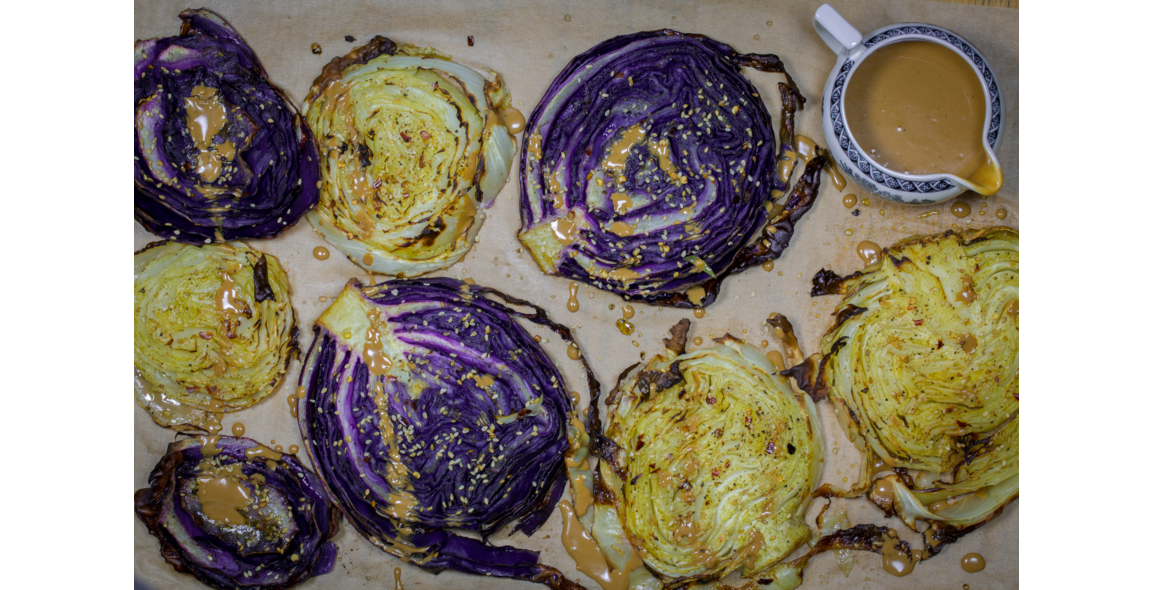 Roasted cabbage steaks with sesame seeds and orient dressing